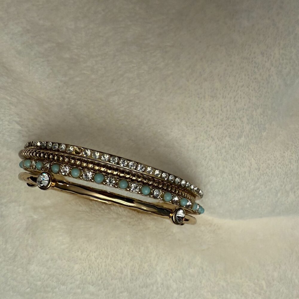 Premier Designs set of 4 gold tone bangle bracelets